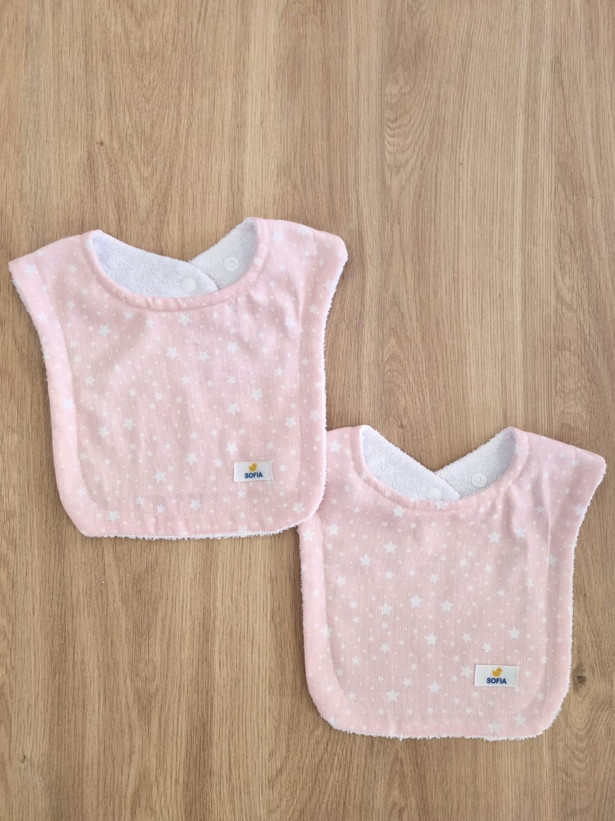 Set de 2 baberos. Rosa Salmón, Estrella Blanca