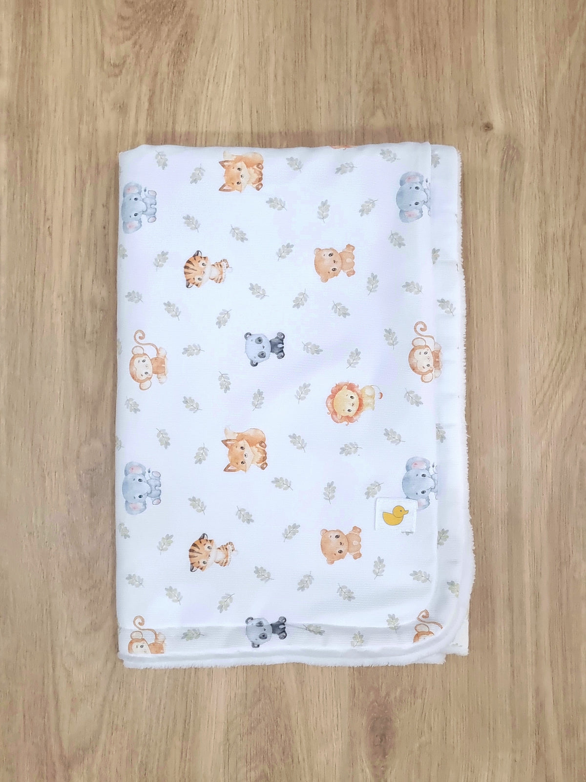 Colcha Polar. Animalitos con hojitas