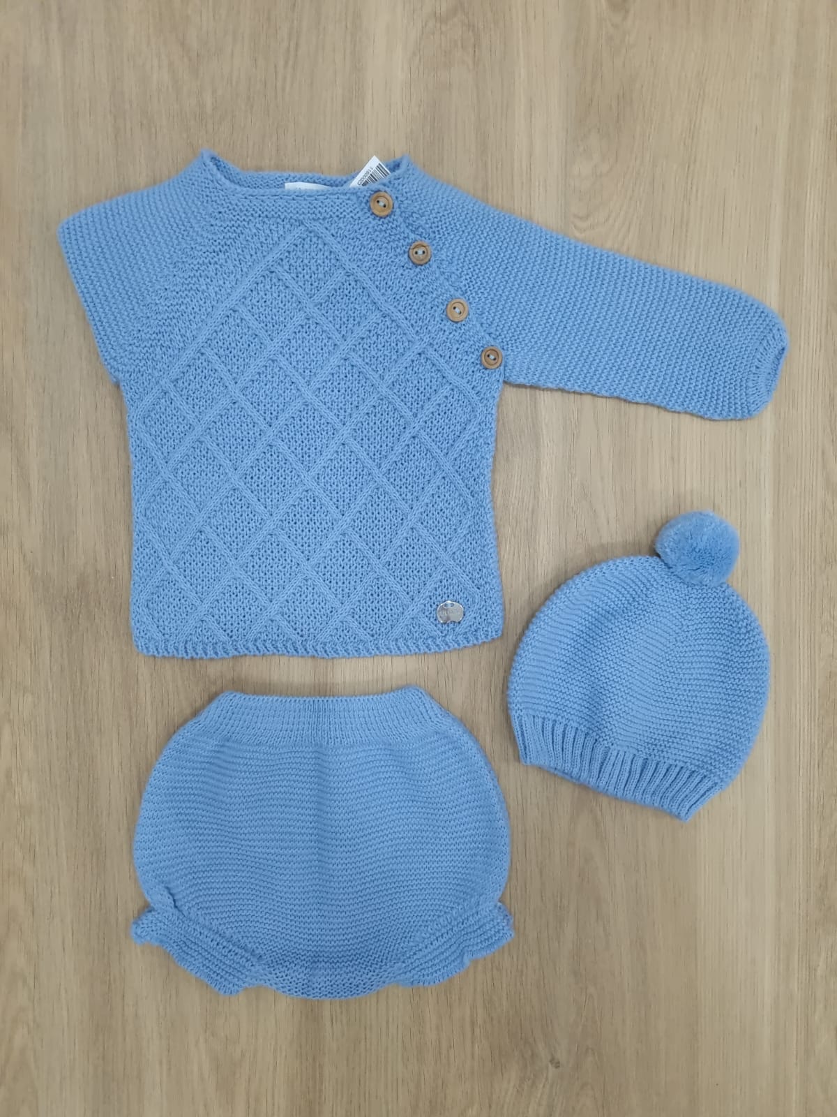 Azul con 4 botones y cubre pañal. 1M