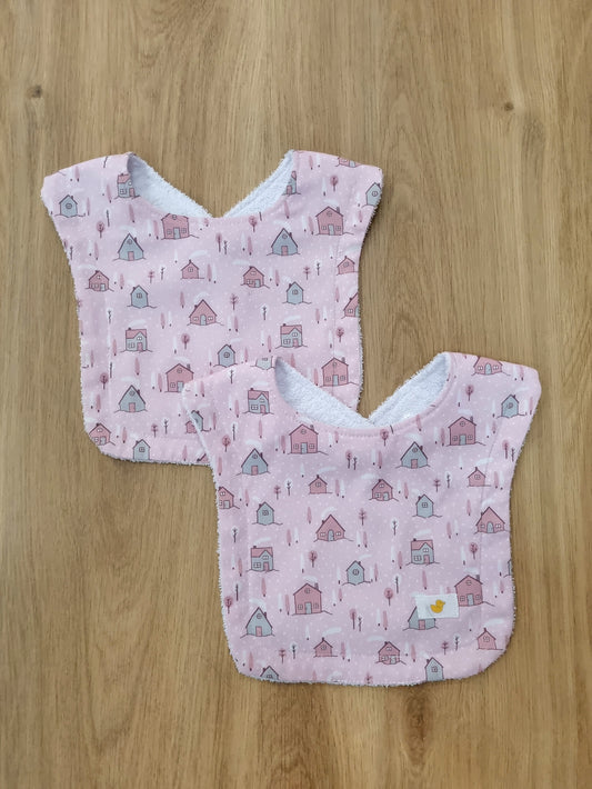Set de 2 baberos. Casitas rosa