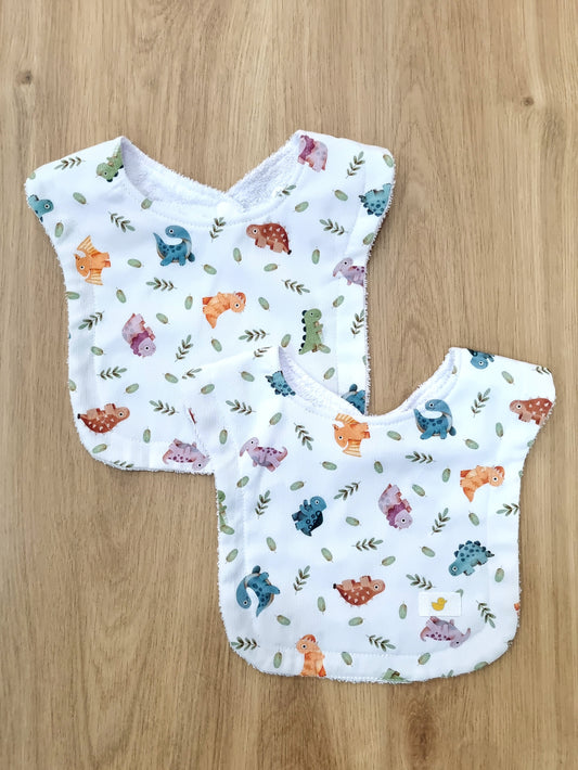 Set de 2 baberos. Dinosaurios de colores