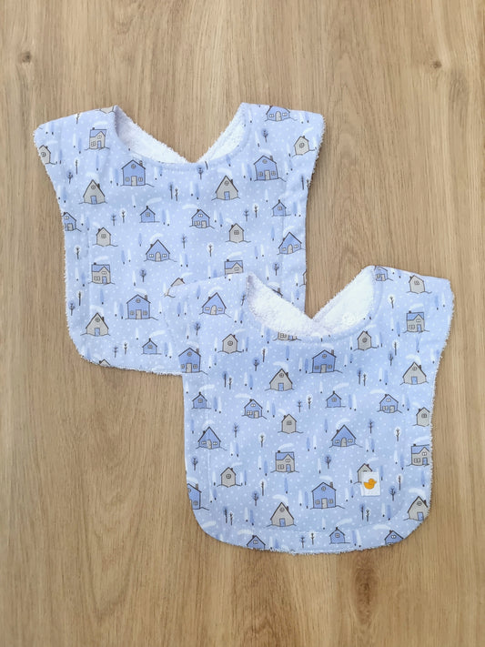 Set de 2 baberos. Casitas azules