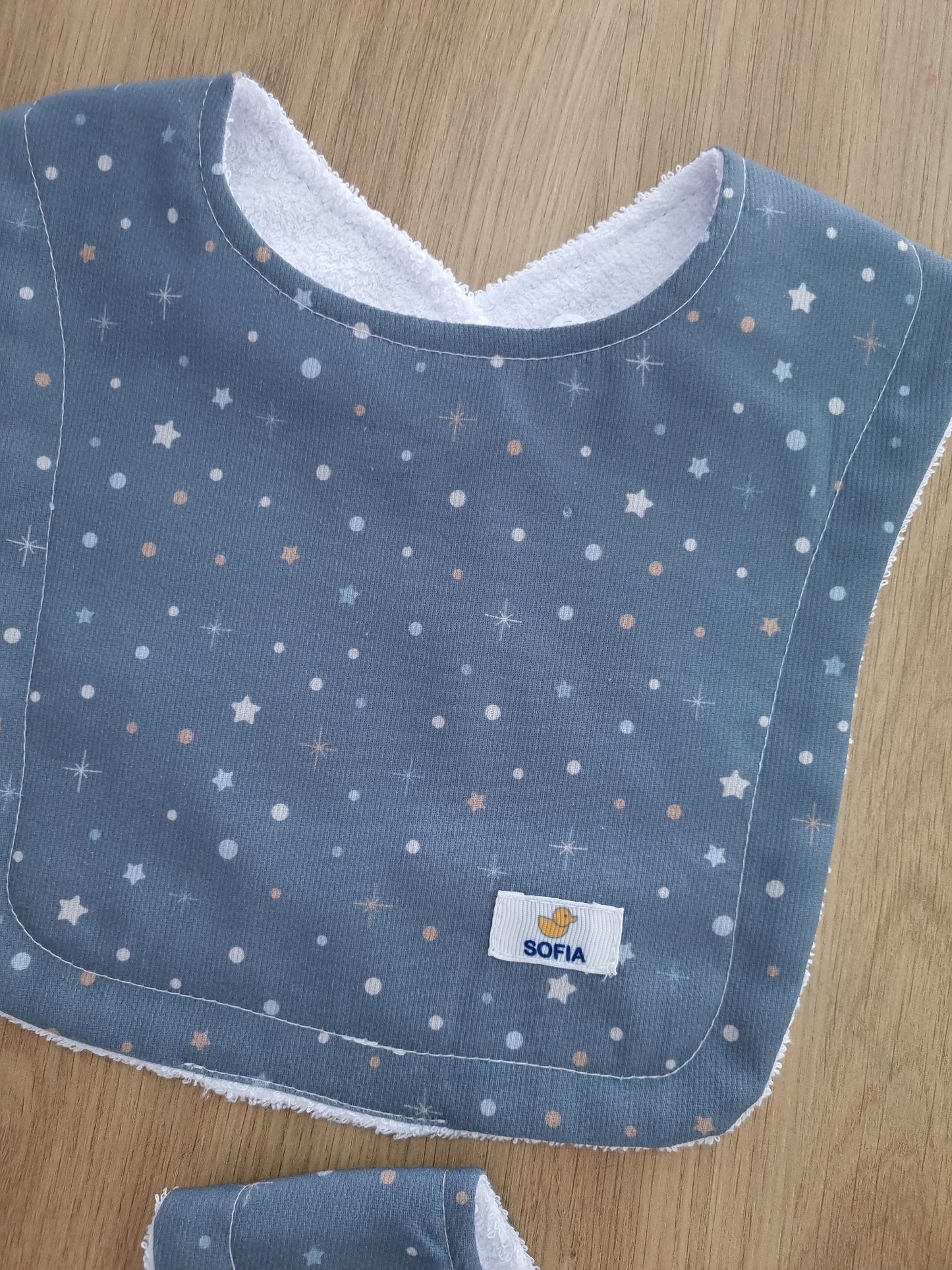 Set de 2 baberos. Azul cielo