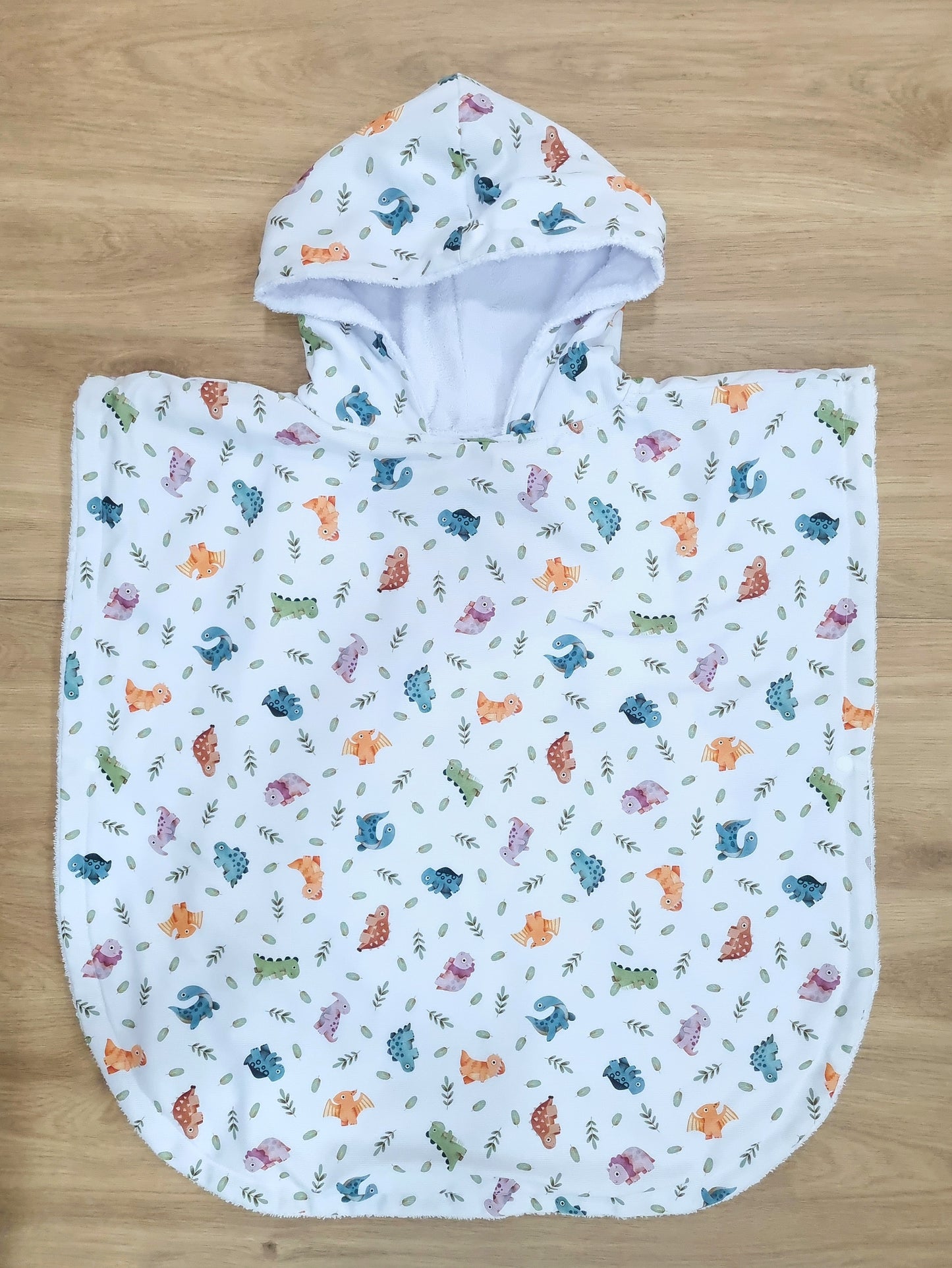 Toalla Poncho Dinosaurios de Colores